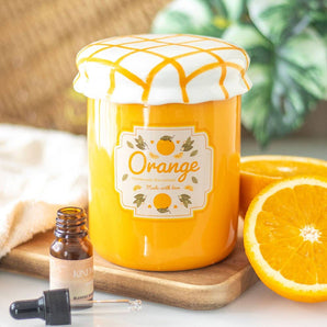 Brûleur à huile et chauffe-cire en pot de marmelade d'orange